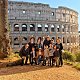Happy guests with tour guide at the Colosseum Rome
