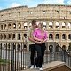Couple hugging with Colosseum in background
Iconic view of the Colosseum for timeless couple portraits